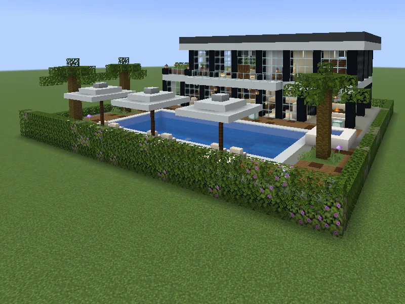 Modern villa in white and black concrete, with a pool and parasols.